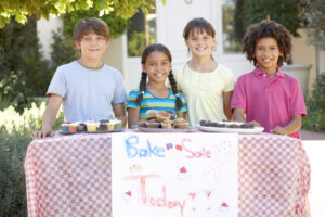 children running a bake sale