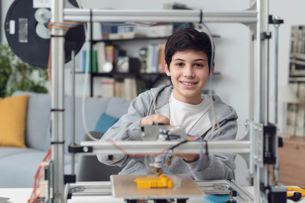 STEM course - student using 3D printing technology